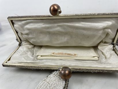 Atelier Lesage Paris Pearl purse with mirror
Refined...