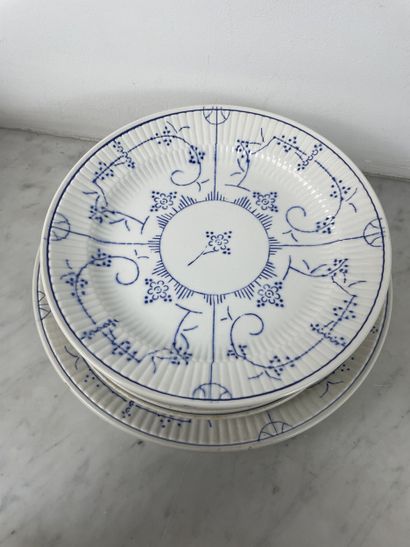 Large earthenware dinner service with blue...