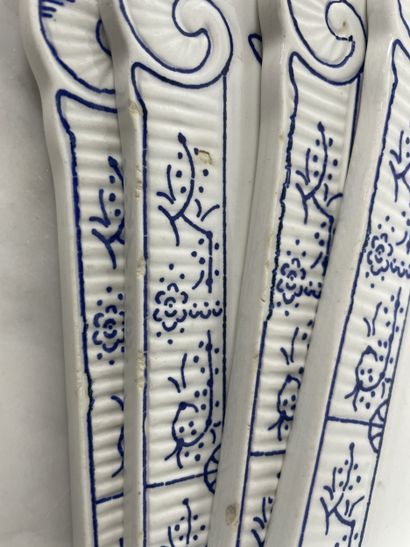 Large earthenware dinner service with blue...