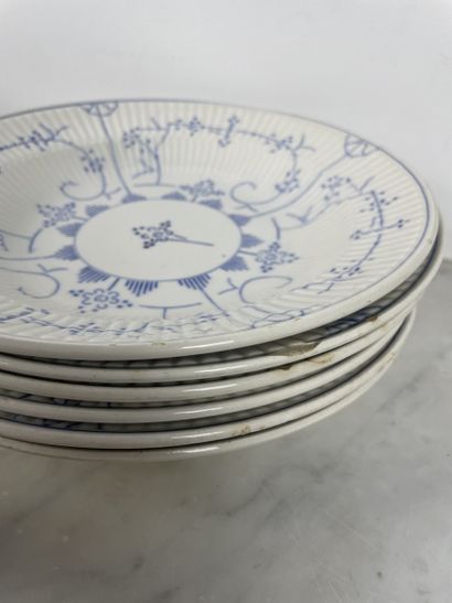 Large earthenware dinner service with blue...