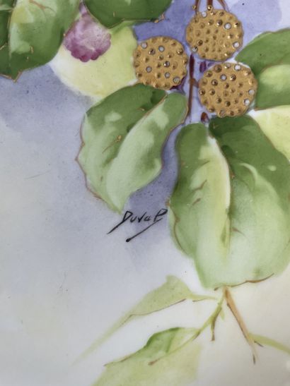 Three decorative plates in hand-painted Limoges...