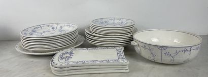 Large earthenware dinner service with blue...