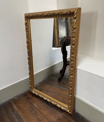 Gilded stucco and wood-framed mirror
Rectangular...