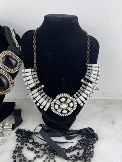 Black, gold and silver costume jewelry set...