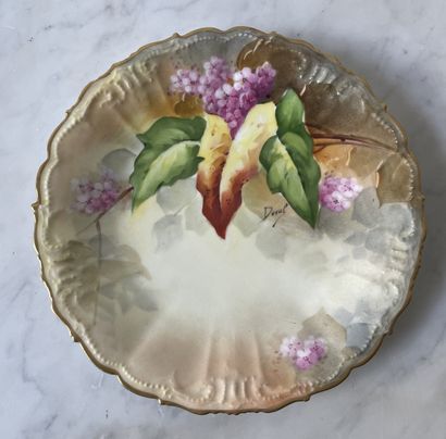 Three decorative plates in hand-painted Limoges...