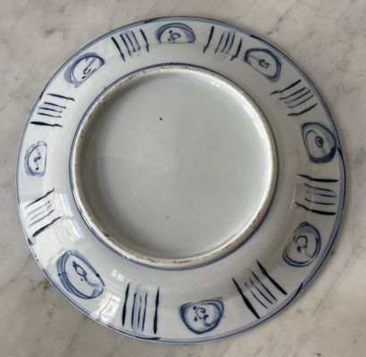 Earthenware dish with blue decoration in...