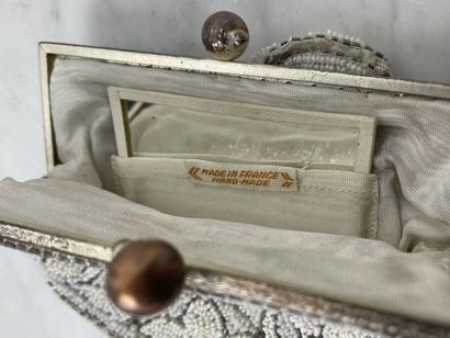Atelier Lesage Paris Pearl purse with mirror
Refined...