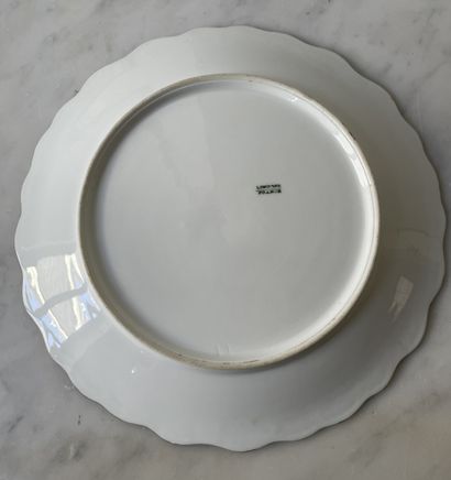 Three decorative plates in hand-painted Limoges...