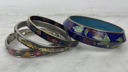 Set of four rigid enameled metal bracelets...
