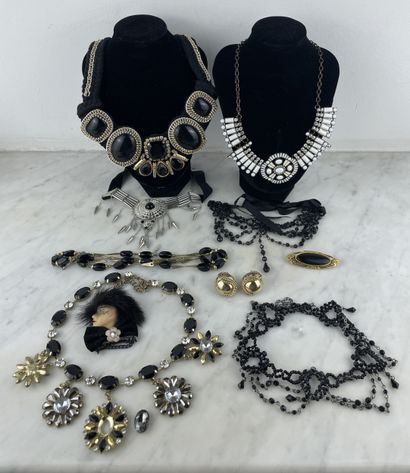 Black, gold and silver costume jewelry set...