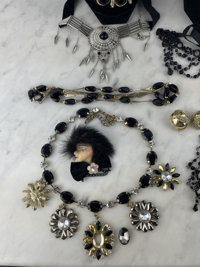 Black, gold and silver costume jewelry set...