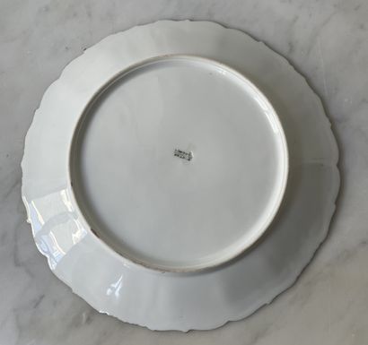 Three decorative plates in hand-painted Limoges...