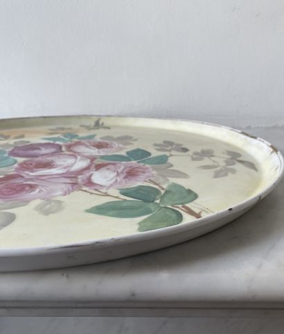 Large glazed earthenware tray, central polychrome...