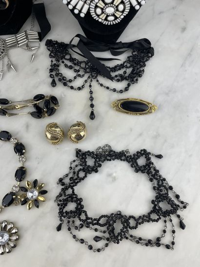 Black, gold and silver costume jewelry set...