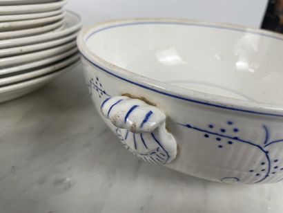 Large earthenware dinner service with blue...