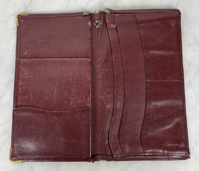 Cartier Lot de quatre pochettes et porte-documents...