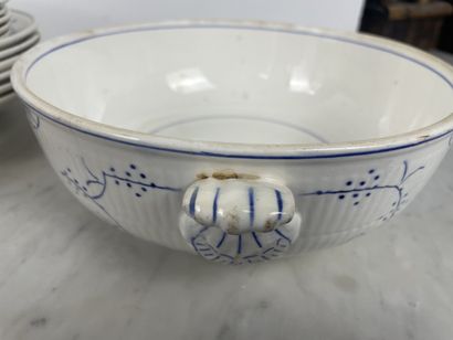 Large earthenware dinner service with blue...