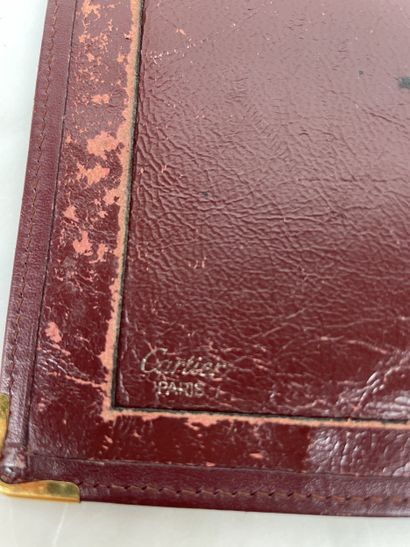 Cartier Lot de quatre pochettes et porte-documents...