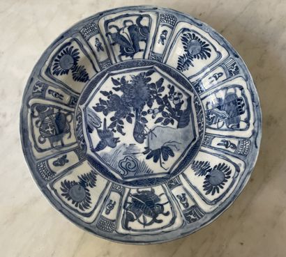 Earthenware dish with blue decoration in...