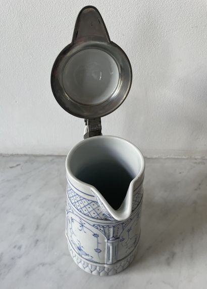 Covered porcelain jug with blue decoration...