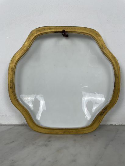 Domed porcelain wall plaque decorated with...