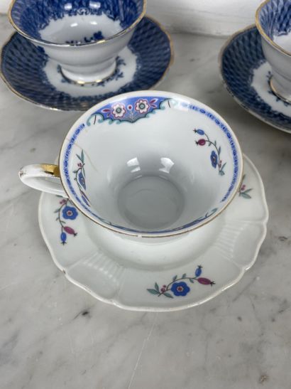 Set of five porcelain cups and saucers, including:...