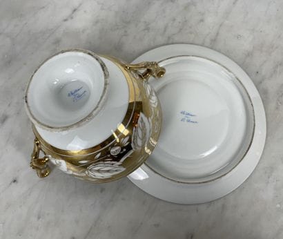 Porcelain two-handled bouillon cup and display...