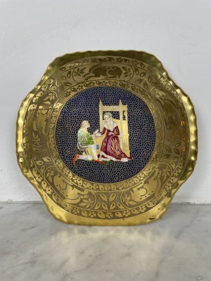Domed porcelain wall plaque decorated with...