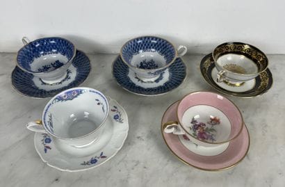 Set of five porcelain cups and saucers, including:...