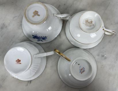 Set of five porcelain cups and saucers, including:...