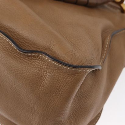 Chloé Marcie Satchel
Studded leather handbag,...