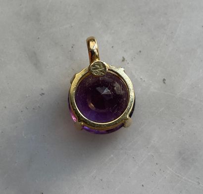 18K gold and 4.5 ct faceted amethyst pendant...