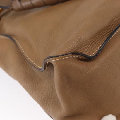Chloé Marcie Satchel
Studded leather handbag,...