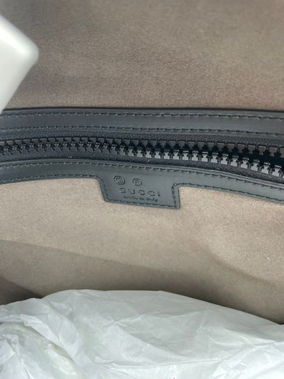 Gucci Front Pocket Backpack
GG coated canvas...