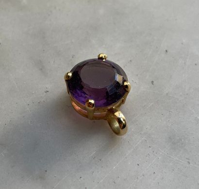 18K gold and 4.5 ct faceted amethyst pendant...