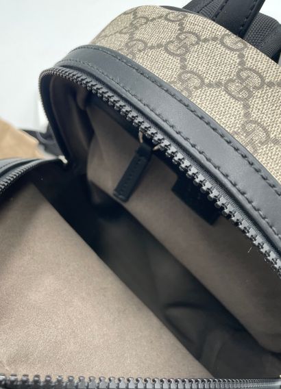Gucci Front Pocket Backpack
GG coated canvas...