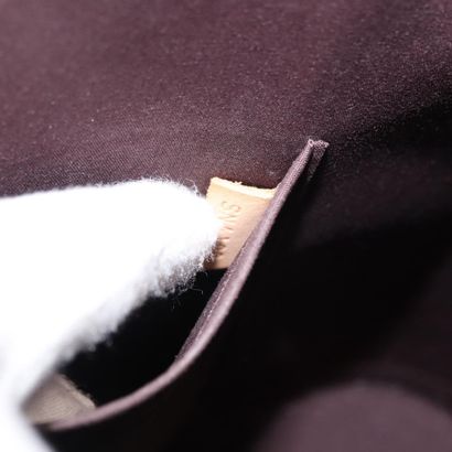 Louis Vuitton Alma Handbag
Monogram patent...