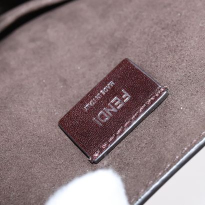 Fendi Curligraphy Shoulder Bag
Enameled patent...