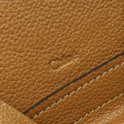 Chloé Paraty Top Handle Bag
Leather handbag,...