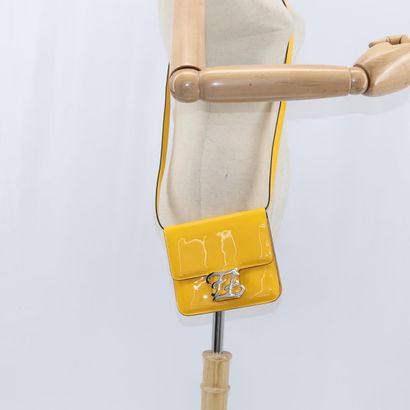 Fendi Curligraphy Shoulder Bag
Enameled patent...