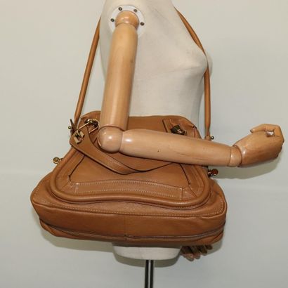 Chloé Paraty Top Handle Bag
Leather handbag,...