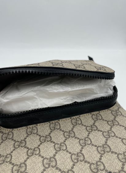 Gucci Front Pocket Backpack
GG coated canvas...