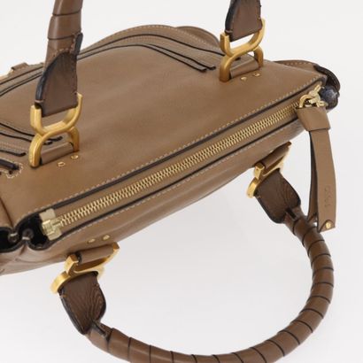 Chloé Marcie Satchel
Studded leather handbag,...