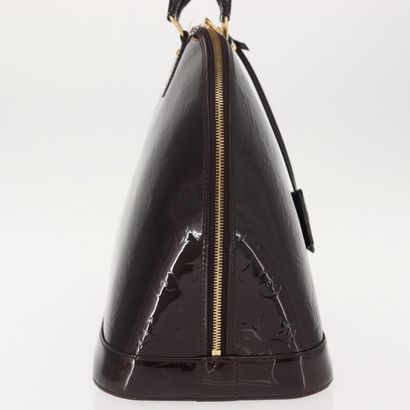 Louis Vuitton Alma Handbag
Monogram patent...