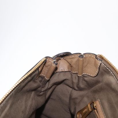 Chloé Marcie Satchel
Studded leather handbag,...
