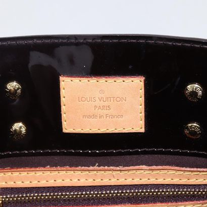 Louis Vuitton Reade
Monogram Vernis patent...