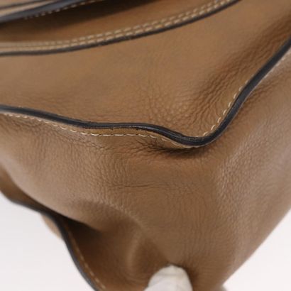 Chloé Marcie Satchel
Studded leather handbag,...
