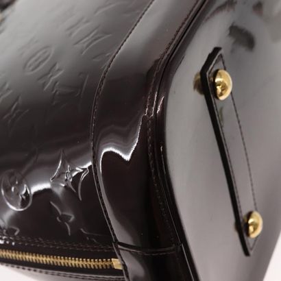 Louis Vuitton Alma Handbag
Monogram patent...