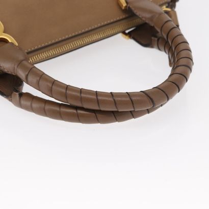 Chloé Marcie Satchel
Studded leather handbag,...