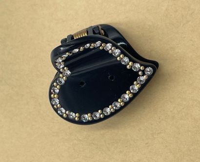 Gucci Interlocking G Heart Hair Clip
Plastic...